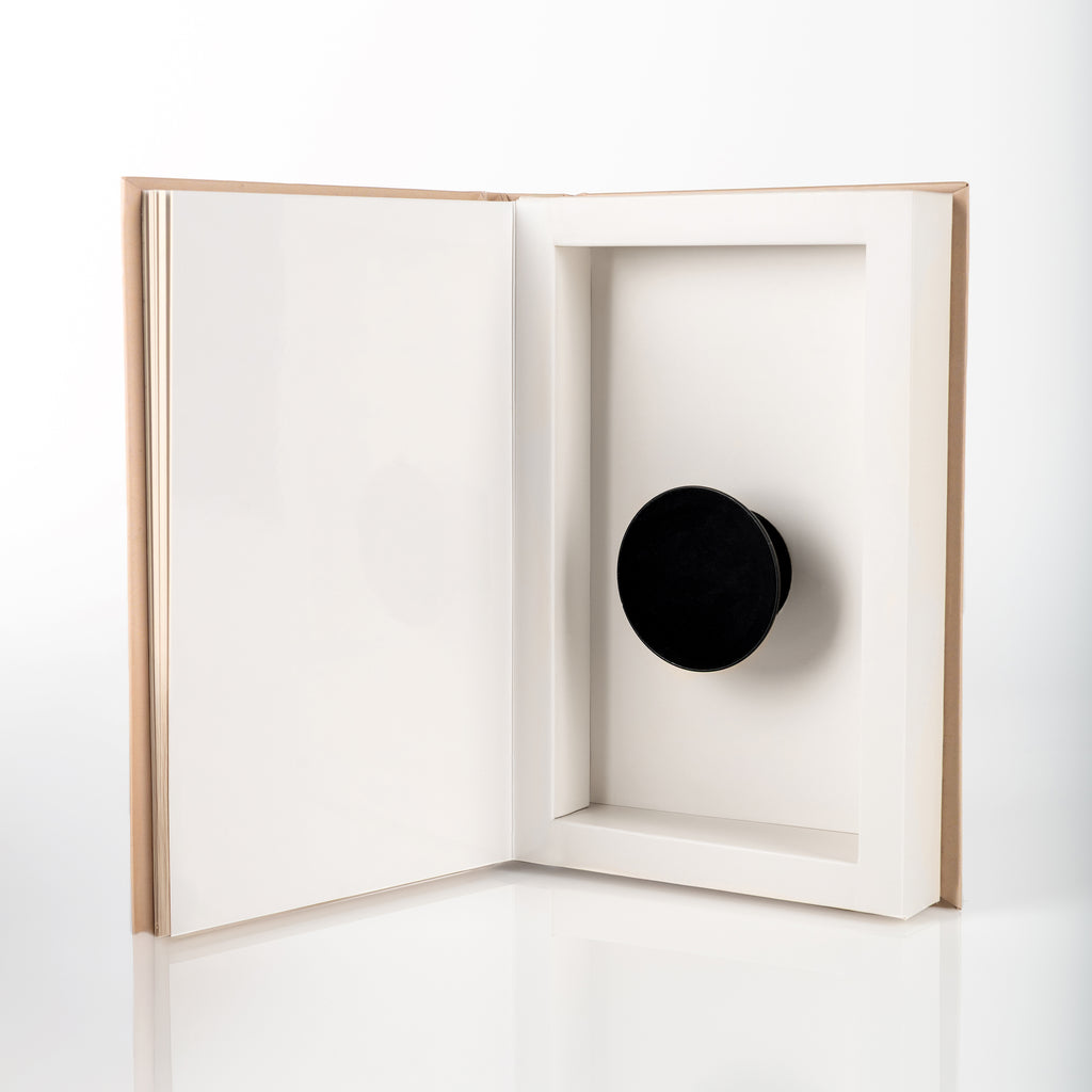 Peek-A-Book hidden smartphone holder inside book design